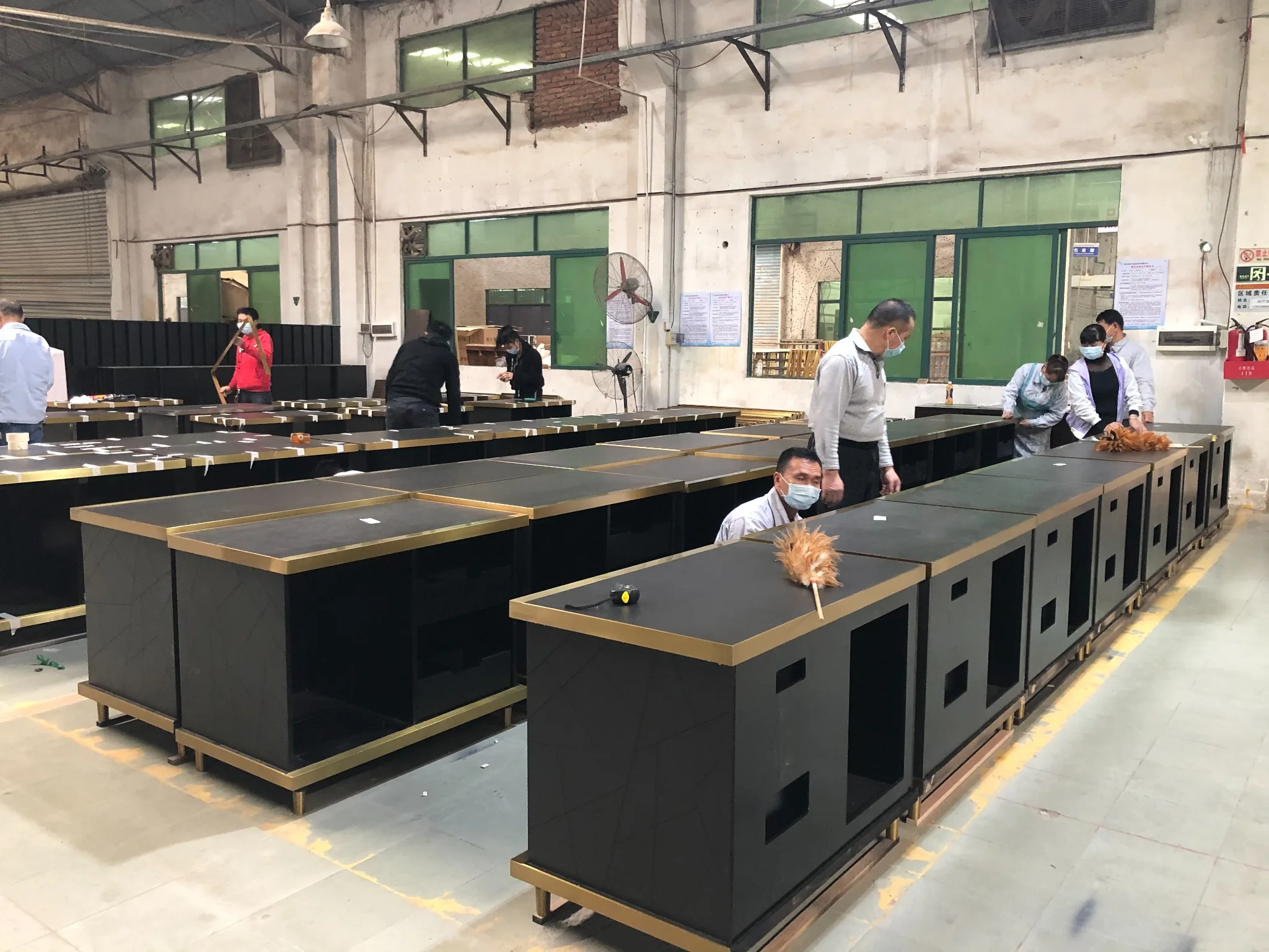 Cabinet assembly in custom casegoods production line