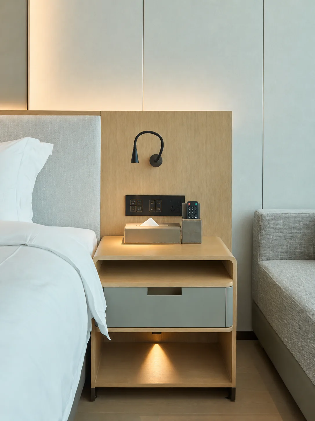Hotel bedside table with charging station